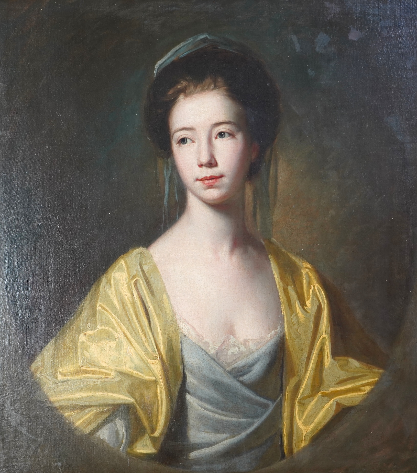 Follower of George Romney, British 1734-1802, A portrait of a young lady with yellow drapery
